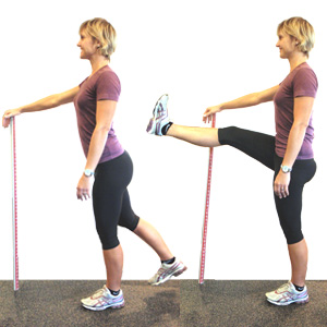Woman doing legswing before a run