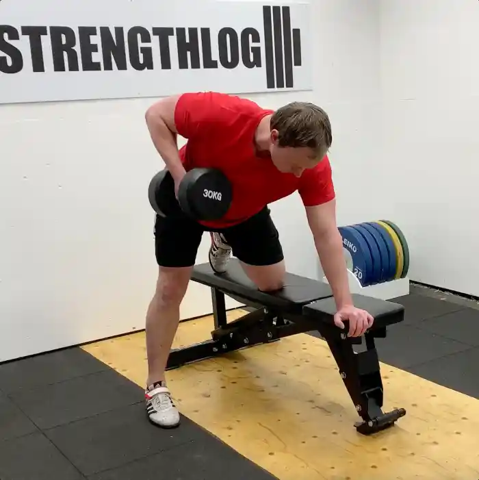 Setup for one arm dumbbell row on bench